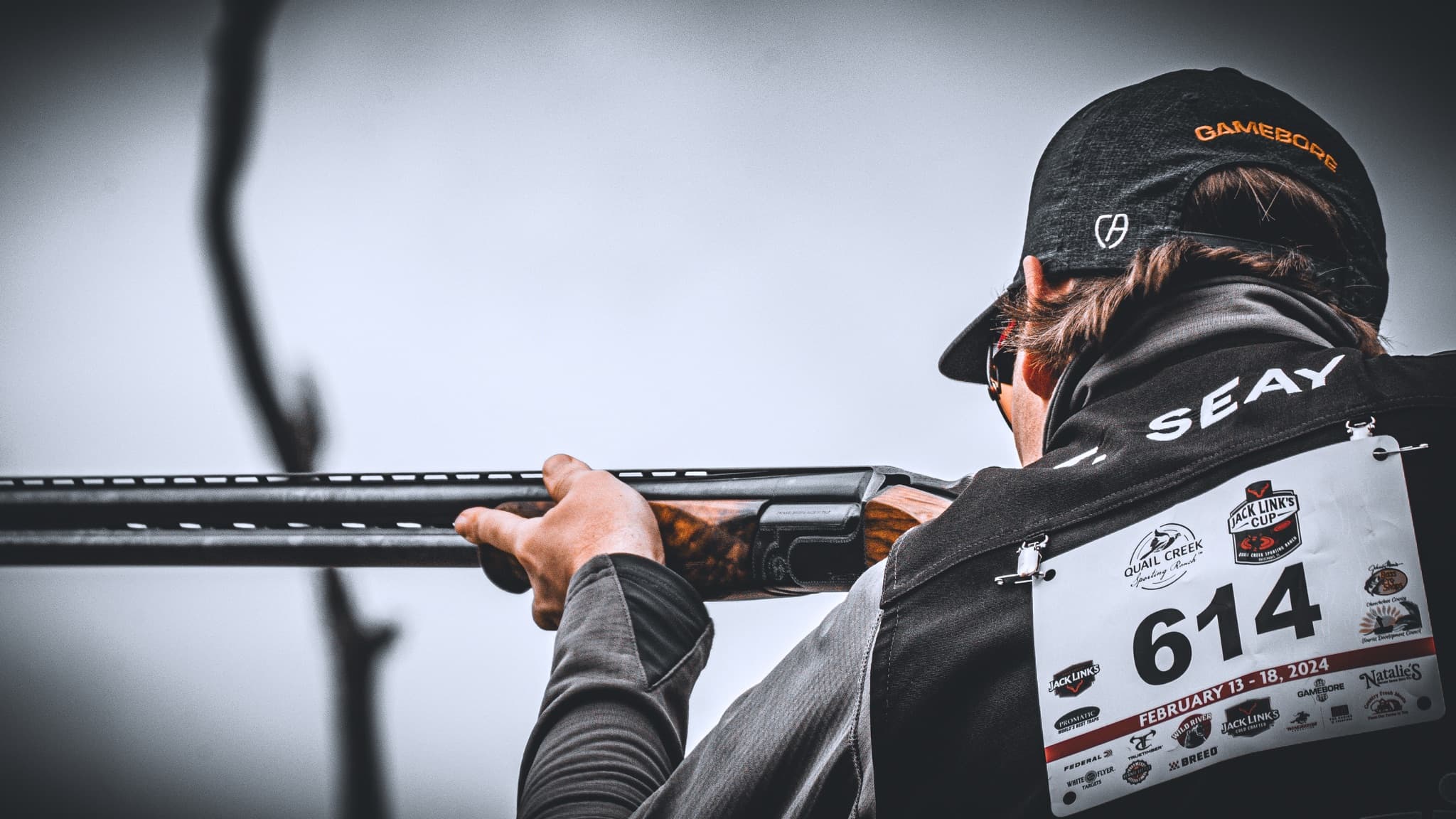 David Radulovich competing with a shotgun on a sporting clays course